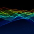 3d rainbow coloured flowing particle waves