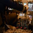 Aviation crew flying airplane with engine lever to throttle, using dashboard command buttons to takeoff. Control panel navigantion and windscreen to fly plane, using power handle. Close up.