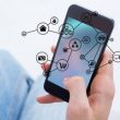 digital composite of hand holding smartphone with vignettes