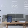 Digital tablet screen with smart home controller on a wooden table