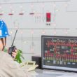Workers in control room