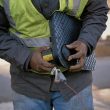 An industrial worker working with technology on site