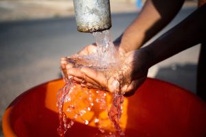 A tap of water running