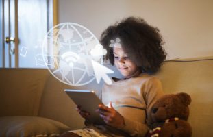 A girl on her smart tablet