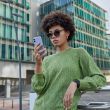 A woman looking at her phone