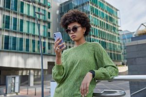 A woman looking at her phone
