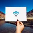 A picture of a wi-fi logo on a mountain background