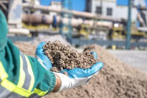 A man holding cement