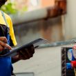 A worker doing a leak test