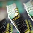 Close-up of printed circuit boards with surface-mounted components, representing a compact certified wireless module for industrial IoT devices